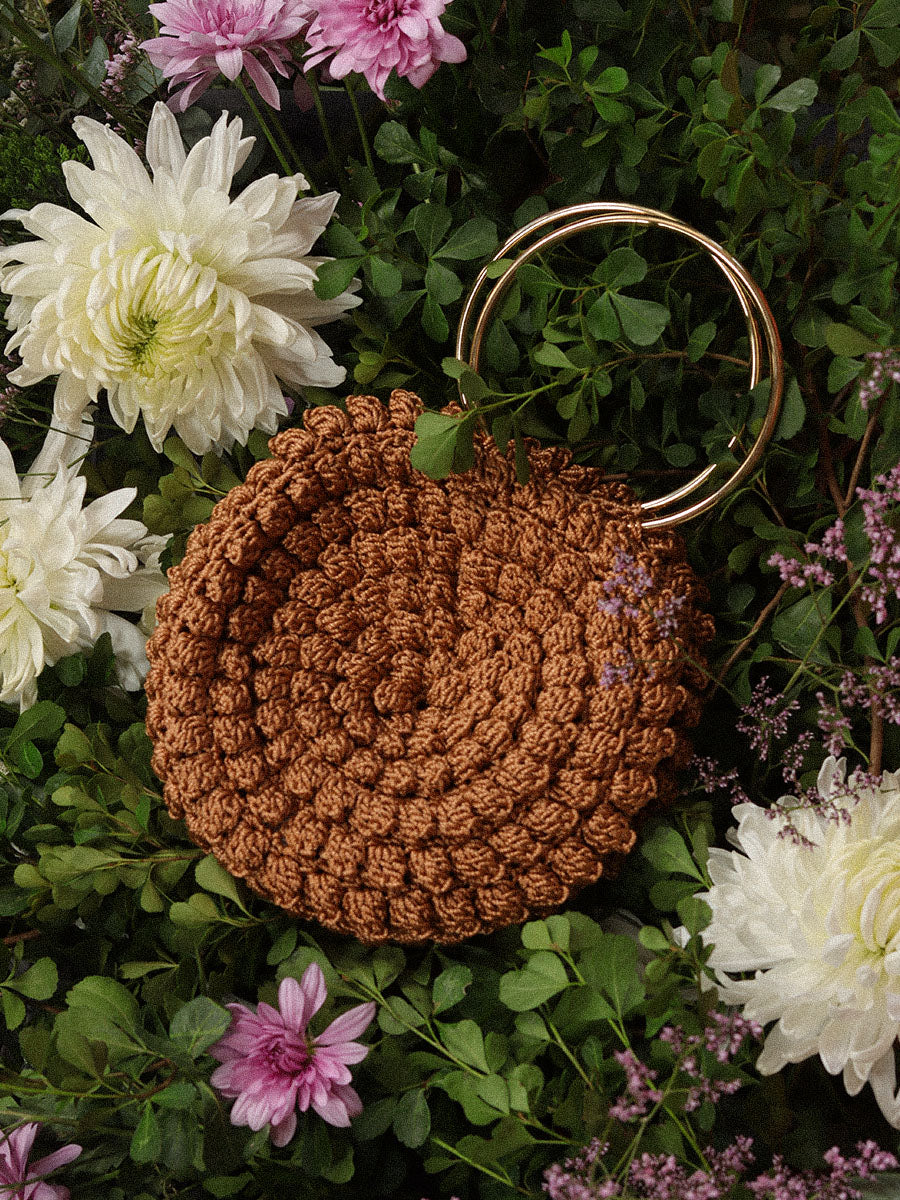 CARTERA TEJIDA COBRE
