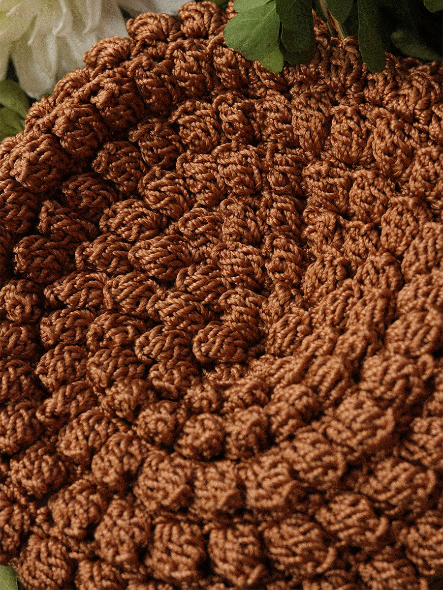 CARTERA TEJIDA COBRE